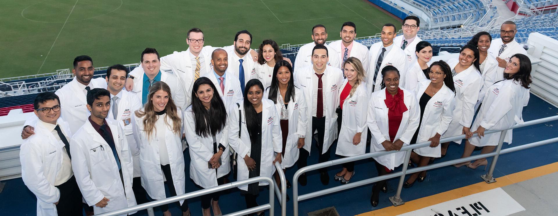 FAU Internal Medicine residents and faculty in the FAU Owls Football Stadium